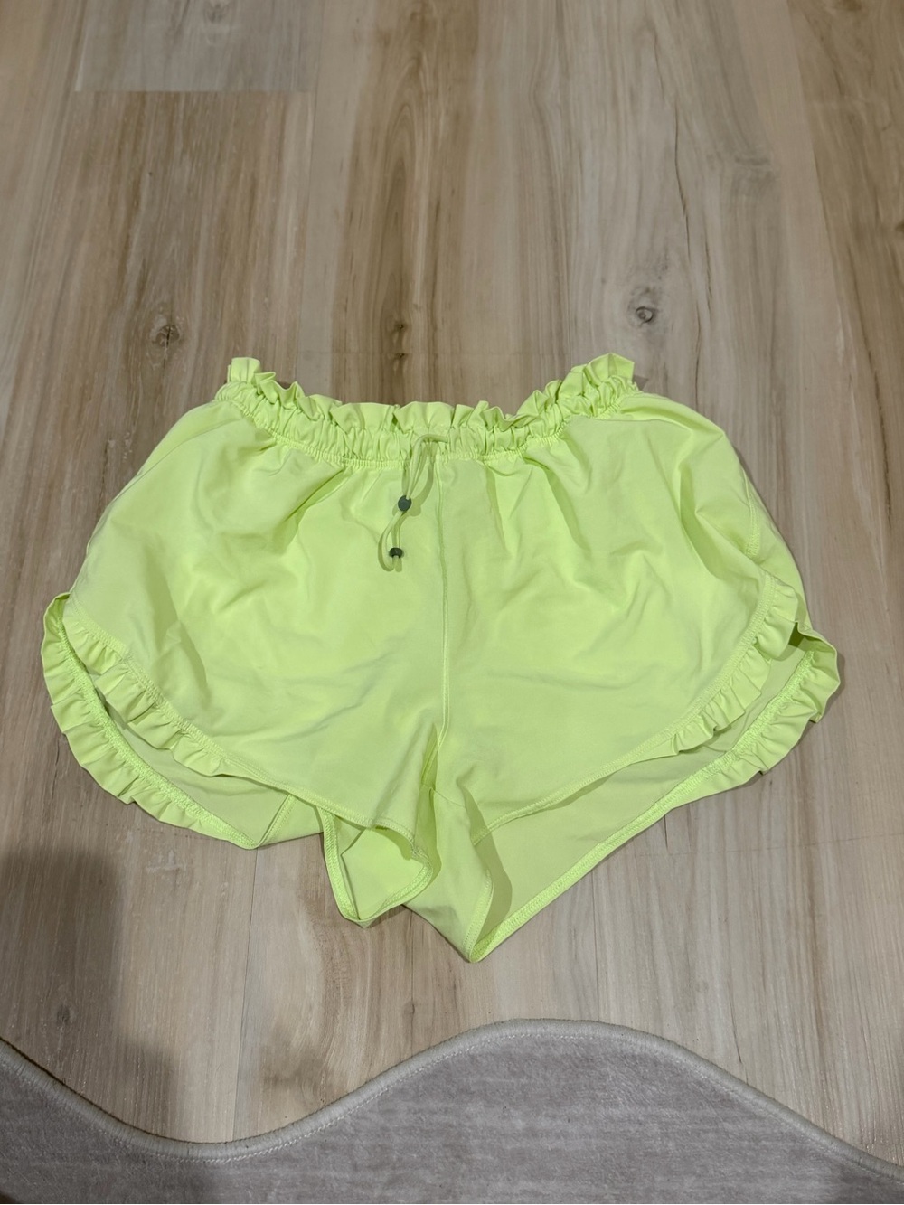 Neon Yellow Ruffle Hem Women's Shorts